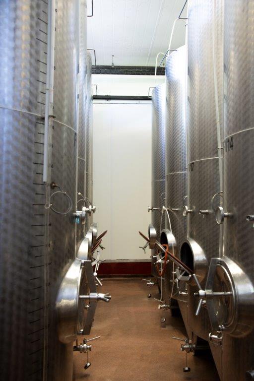 Stainless steel wine fermentation tanks at Three Choirs Vineyards